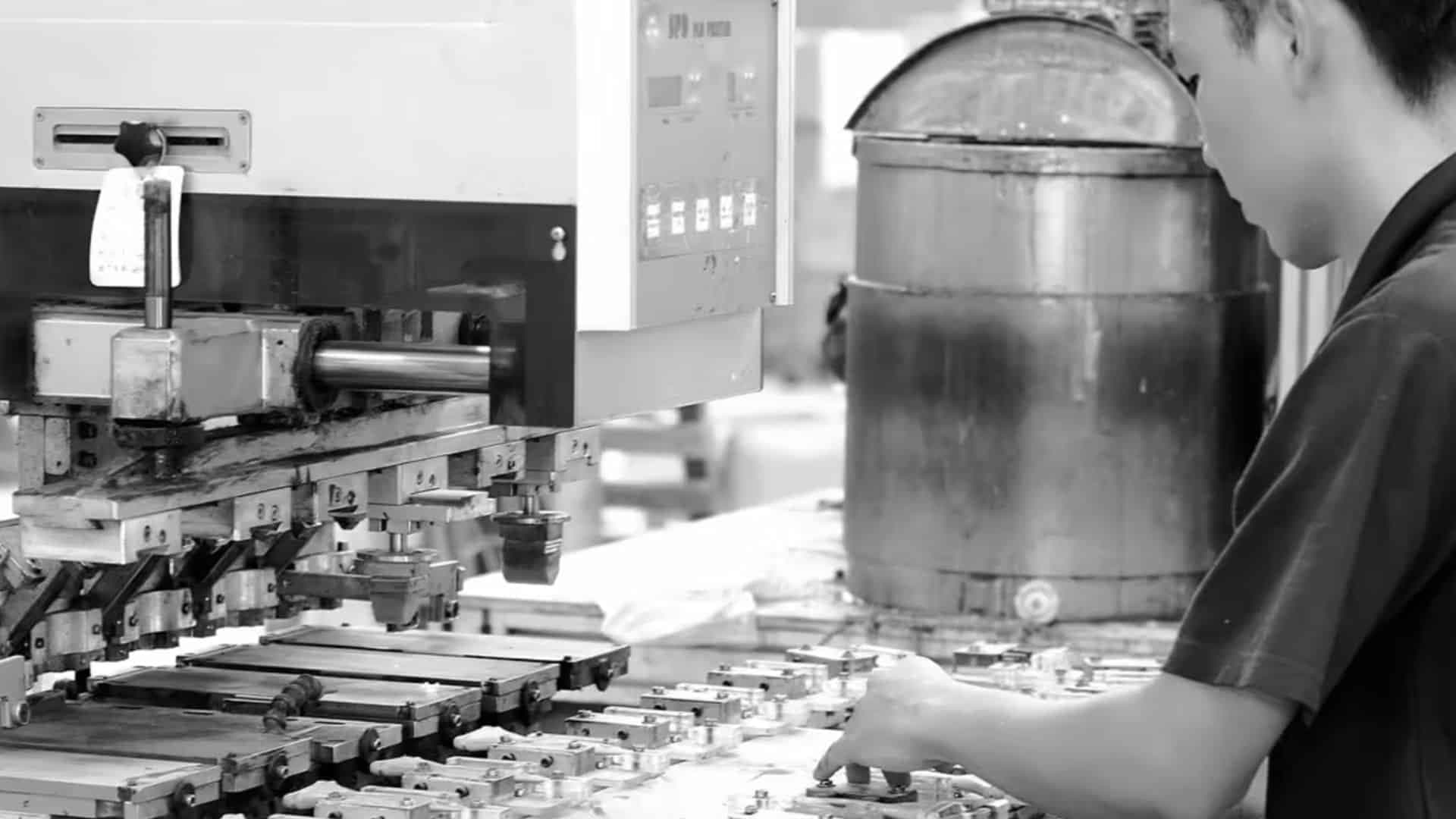Manufacturing worker checking the conveyor